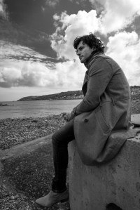 Rewan (not pronounced 'Rowan') Tremethick is a British author who was named after a saint. St. Ruan was invulnerable to wolves; Rewan isn't . Rewan is a fan of clever plots, strong women who don't have to be described using words like 'feisty', and epic music. He has dabbled in stand-up comedy, radio presenting, and writing sentences without trying to make a joke. He balances his desire to write something meaningful by wearing extremely tight jeans. 