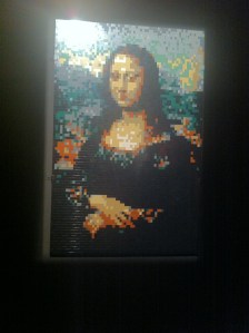 Who tours Paris without seeing the Mona Lisa? Only... the one in the Louvre is hidden behind a forest of tourist selfie-sticks. The one at sculptor Nathan Sawaya's Paris Exhibition was pixilated but accessible.