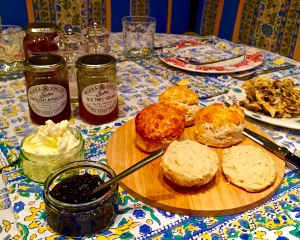 The actual scone recipe is a closely guarded village secret. If I gave it to you, I'd have to kill you. But this one is very close: http://www.bbcgoodfood.com/recipes/4622/classic-scones-with-jam-and-clotted-cream