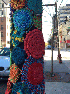 Evanston, IL The yarn bombers strike again. (Because even telephone poles need a comfy blankie...)