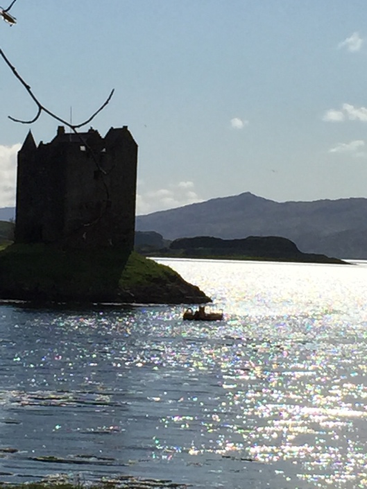 Castle Stalker, inspiration for Highland Magic. TEASER - for THIS HIGHLAND MAGIC Dr Henriette Bruar travels to north to catalogue the library in an ancient castle set in the middle of a remote Highland loch. The laird, Sir Malcolm MacKenzie, of that Ilk, is pressed for cash and selling off the estate’s assets, including the library. This doesn’t please his son, Keir, who fears there will be nothing of the estate left to inherit. To all outward appearances, Henriette seems like just any run of the mill academic, unremarkable even. However, she sees herself as a cross between Indiana Jones and the Relic Hunter, and dreams of one day finding a precious manuscript, a hidden treasure or the key to unlocking family secrets. By the end of the novel, Henri learns that treasure comes in many guises and, sometimes, family secrets are best left undisturbed. 