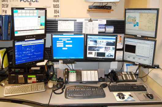 Dispatch Desk [image credit: Massachusetts Communications Supervisors Assn.] http://ma911.org/
