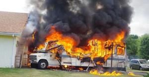 How the kids pray the family trip will be (hopefully before leaving their driveway) [Image credit: Statter911.com] http://www.statter911.com/2014/07/28/early-video-rv-suv-fire-threatening-roscoe-il-home/
