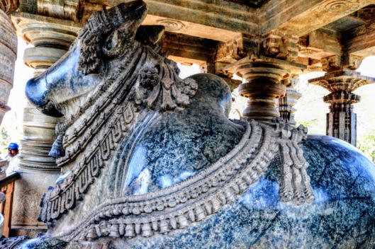 Nandi, the bull companion of the God Shiva, at Halebidu Temple complex. This is one of a pair of monolithic sculptures of Nandi which guard the outside of the temple.